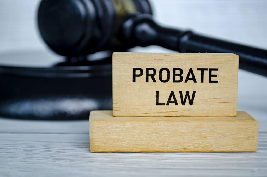 Probate Law text on wooden block with blurred lawyer gavel background Probate law concept